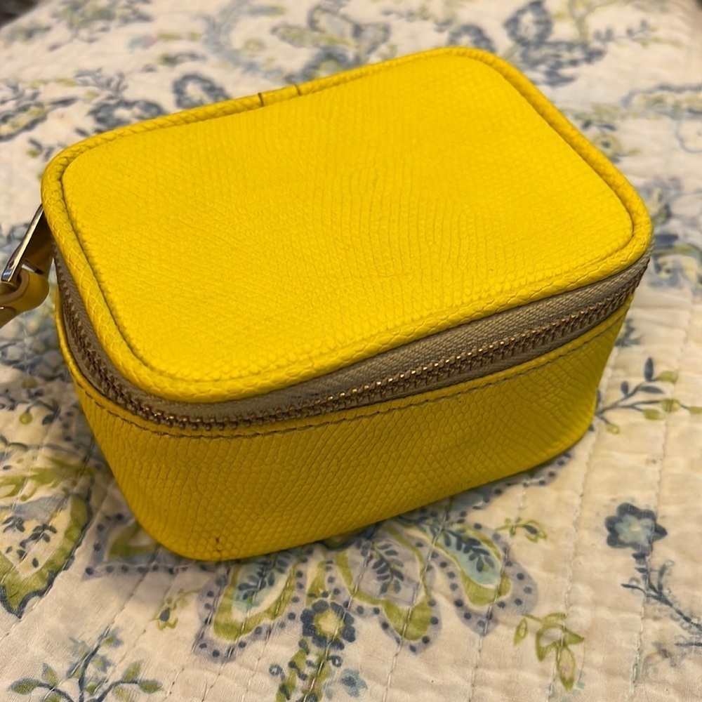 Fossil jewelry bag. Yellow. New with tags